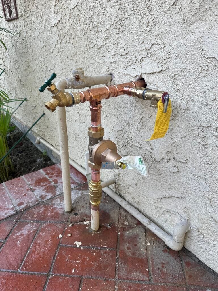 Copper repiping installation replacing old galvanized water lines with new Type L copper piping throughout the home